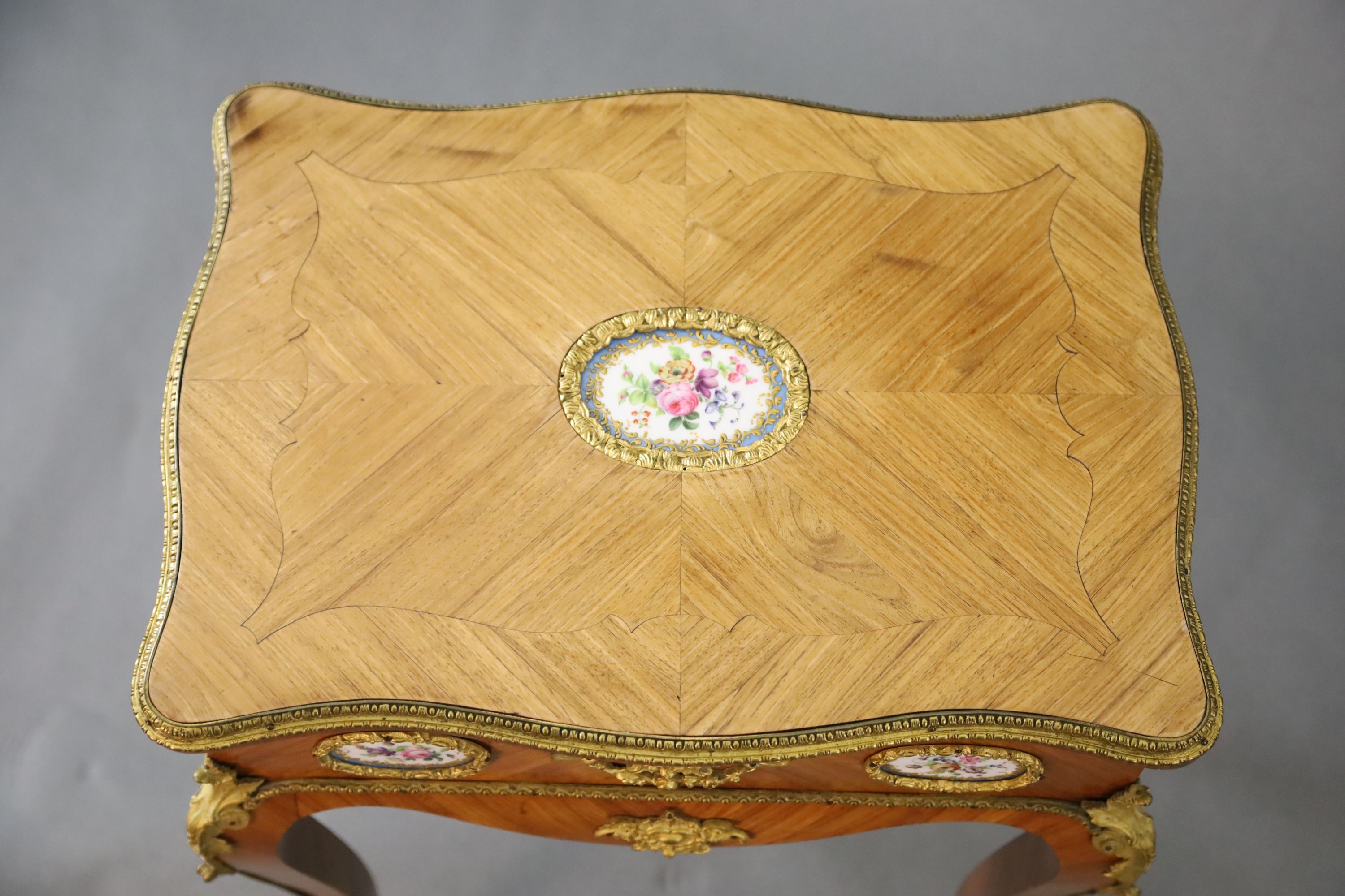 A late 19th century French Louis XV style ormolu kingwood work table, W.1ft 8in. D.1ft 2.5in. H.2ft 3in.